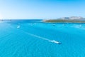 Vacation and leisure. Aerial view on fast boat on blue Mediterranean sea at sunny day. Yachts near the coast. Royalty Free Stock Photo