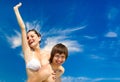 Vacation or love concept. Smiling couple having fun over sky background Royalty Free Stock Photo