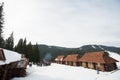 Vacation mountain log house in the ski resort. Winter wonderland