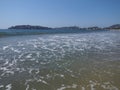 Vacation panorama of sandy beach at bay of ACAPULCO city in Mexico and waves of Pacific Ocean landscape Royalty Free Stock Photo