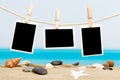 Vacation photos hanging on a Royalty Free Stock Photo