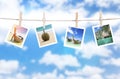 Vacation photos hanging on a rope Royalty Free Stock Photo