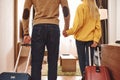 Vacation starts. Cropped couple checking in their holiday rental apartment Royalty Free Stock Photo