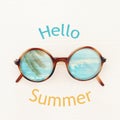 vacation and summer image with sunglasse over white wooden background.