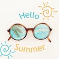 vacation and summer image with sunglasse over white wooden background.