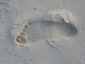 Human footprints in the white ocean sand of Maldives Royalty Free Stock Photo