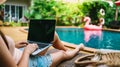 Vacation Woman working on her laptop in holiday  remote online working digital Freelance work concept Royalty Free Stock Photo