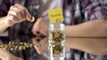 Vacation word written above glass jar with money, savings for summer holidays Royalty Free Stock Photo