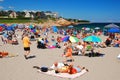 Vacationers crowd the beach day