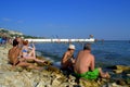 Vacationers relaxing on Balchik beach Royalty Free Stock Photo