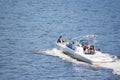 Vacationers ride boats and boats on the river