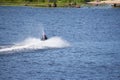 Vacationers ride boats and boats on the river