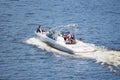 Vacationers ride boats and boats on the river