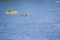 Vacationers ride boats and boats on the river