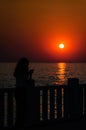 Vacationers On The Sunset Shore