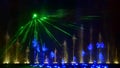 Colorful water fountains. Dancing water jet led light fountains