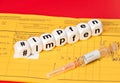 Vaccinate; vaccine written with dice