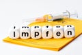 Vaccinate; vaccine written with dice Royalty Free Stock Photo