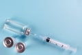 Vaccination. Bottles of vaccine, a syringe Royalty Free Stock Photo