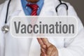 Vaccination Button - Doctor touching screen Royalty Free Stock Photo