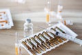 Medicine and syringe on table background, Healthcare and medical Royalty Free Stock Photo