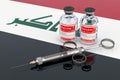 Vaccination in Iraq concept. Vaccine bottles with syringe on the Iraqi flag, 3D rendering