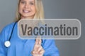 Vaccination Sign - Female doctor touching screen