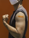 Vaccinations, bandage plaster on vaccinated people`s arm concept. Royalty Free Stock Photo