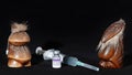 COVID-19 coronavirus vaccine, injection syringe and Gods figurines