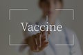 Vaccine text over image of a nurse holding an injection needle Royalty Free Stock Photo