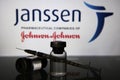 Vaccine vials and syringe with Janssen Pharmaceutical logo