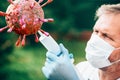 Vaccines for influenza a virus and coronavirus medical fight diseases as a doctor fights a group of infectious cell pathogens.The Royalty Free Stock Photo