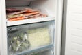 Vacuum bags with different products in fridge. Food storage