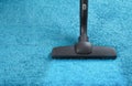 Vacuum cleaner cleaning carpet Royalty Free Stock Photo