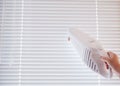 Vacuum cleaner - cleaning window blinds Royalty Free Stock Photo