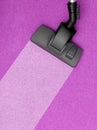 Vacuum cleaner head on pink carper Royalty Free Stock Photo