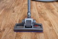 Vacuum cleaner used on parquet wooden floor