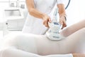 Vacuum massage. Endermology, abdominal vacuum massage. A woman`s body during a care treatment Royalty Free Stock Photo