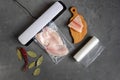 Vacuum packaging of fish. The use of a vacuum sealer for long-term storage of products. Top view