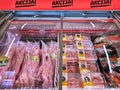 Vacuum-packed fresh rabbit meat and frozen beef steaks with promotional discounts