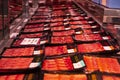 Vacuum-packed red Iberian jamon, spanish ham, in plastic package on the famous market in Barcelona, Catalonia, Spain. 30