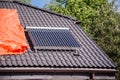 Vacuum pipe solar water heating system on the house roof Royalty Free Stock Photo