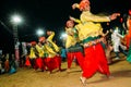 Vadodara, India - 20 october 2018: men and women in traditional indian dresses dance garba during hindu navratri festival