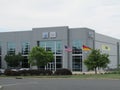 Volkswagen VAG VW Audi Distribution Center warehouse in NJ. Flags of USA, Germany and State of New Jersey.