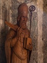 VAGLI SOTTO, LUCCA, ITALY AUGUST 9, 2019: Old carved statue of St Augustine to whom the small church in Vagli Sotto is