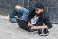Vagrant with computer Royalty Free Stock Photo