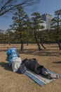 Vagrants in a park in the Nijubashimae district of Tokyo, Royalty Free Stock Photo