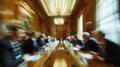 A vague glimpse of a board meeting in session with indistinguishable faces and expressions Royalty Free Stock Photo
