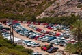 VAI, CRETE - 15 JULY 2021: Large numbers of similary coloured rental cars parked at Vai beach in Eastern Crete Greece Royalty Free Stock Photo