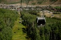 Vail, Colorado, USA - September 1, 2018 - Cable gondolas going up and down the mountain from Gondola One Station. Royalty Free Stock Photo